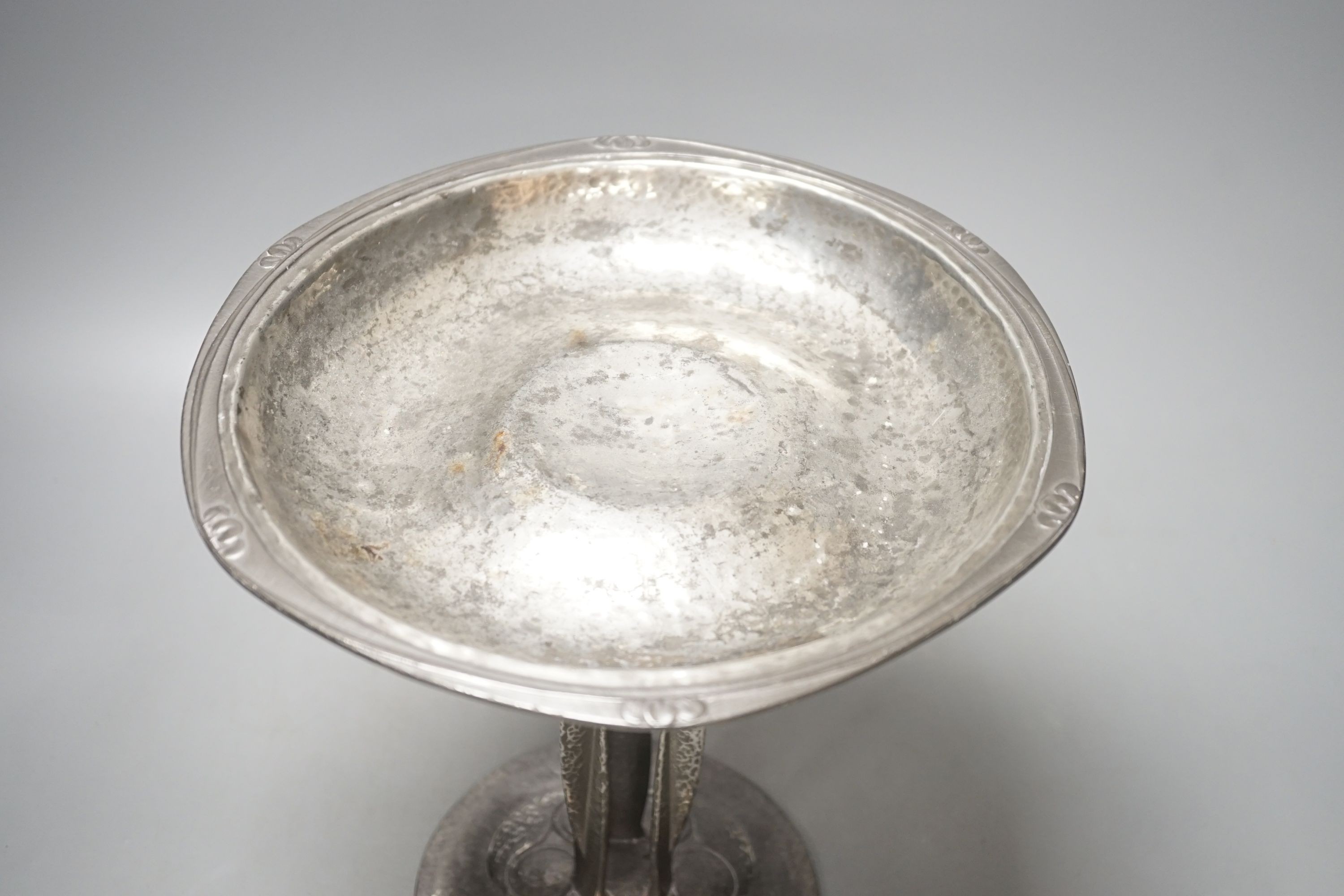 A Liberty's Tudric tazza, designed by Archibald Knox, stamped English pewter 01161, 25 cms high.